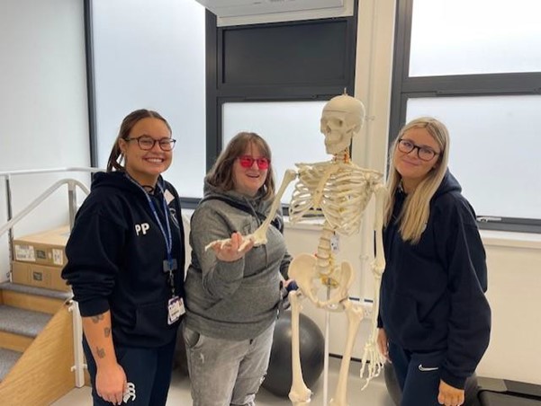 Programme participants with model of skeleton