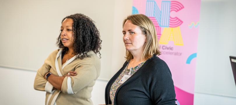 Gemma (left) and Zoe (right) presenting at an NCIA event 