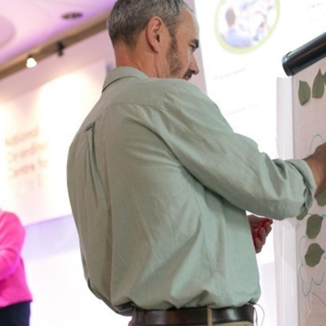 Sophie Duncan and Paul Manners presenting at a conference